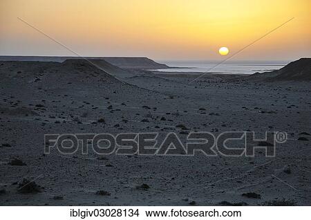 "Sunset over the stone desert at the Rio de Oro Bay, Westsahara, bei Dakhla, Oued Ed-Dahab-Lagouira region, Morocco, Africa" View Large Photo Image Picture - "Sunset over the stone desert at the Rio de Oro Bay, Westsahara, bei Dakhla, Oued Ed-Dahab-Lagouira region, Morocco, Africa". Fotosearch