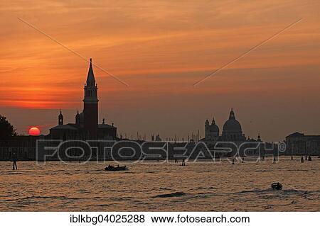Stock Photo - "Sunset over Venice Lagoon with San Giorgio and Santa Maria, Venice Lagoon, Venice, Veneto, Italy, Europe". Fotosearch