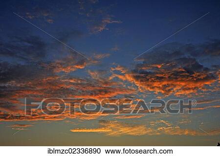 Stock Image - "Sunset sky, Kuhlrade, Mecklenburg-Western Pomerania, Germany, Europe". Fotosearch