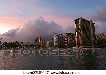 "Sunset, Waikiki Beach, Hilton Hawaiian Village, Honolulu, O'ahu, Hawai'i, USA, America" View Large Photo Image Stock Photo - "Sunset, Waikiki Beach, Hilton Hawaiian Village, Honolulu, O'ahu, Hawai'i, USA, America". Fotosearch