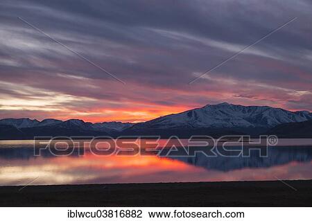 "Sunset with an intense coloured sky reflected in Khoton Nuur, Altai-Tawan Bogd National Park, Tsengel, Bajan-Olgii, High Altai Mountains, Mongolia, Asia" View Large Photo Image Stock Image - "Sunset with an intense coloured sky reflected in Khoton Nuur, Altai-Tawan Bogd National Park, Tsengel, Bajan-Olgii, High Altai Mountains, Mongolia, Asia". Fotosearch