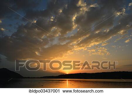 "Sunset with clouds above Lake Klopeiner See, Unterburg am Klopeiner See, Carinthia, Austria, Europe" View Large Photo Image Stock Image - "Sunset with clouds above Lake Klopeiner See, Unterburg am Klopeiner See, Carinthia, Austria, Europe". Fotosearch