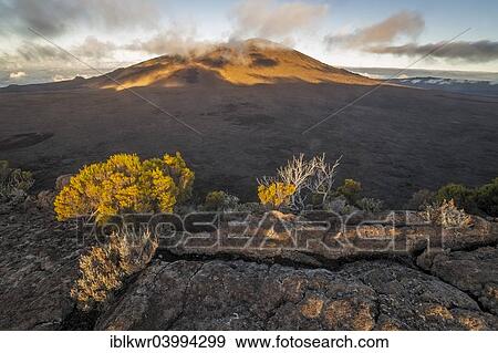 "Sunset with clouds over the crater of the Piton de la Fournaise volcano, Reunion, Africa" View Large Photo Image Stock Photo - "Sunset with clouds over the crater of the Piton de la Fournaise volcano, Reunion, Africa". Fotosearch