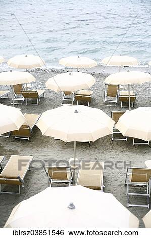 "Sunshades on the beach, Sanremo, Italy, Europe" View Large Photo Image Stock Photograph - "Sunshades on the beach, Sanremo, Italy, Europe". Fotosearch