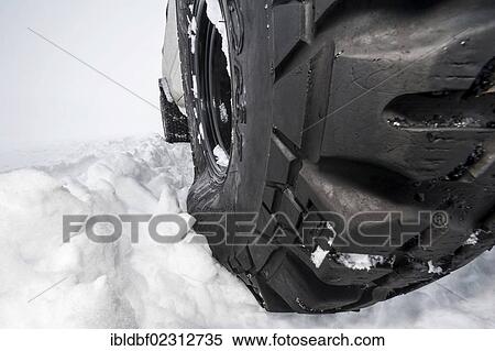 "Super Jeep tyres with low air pressure for better grip on snow, Iceland, Europe" View Large Photo Image Stock Photography - "Super Jeep tyres with low air pressure for better grip on snow, Iceland, Europe". Fotosearch