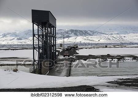 "Super Jeeps approaching a bridge, Pjorsa River, winter landscape, Icelandic Highlands, Iceland, Europe" View Large Photo Image Stock Photo - "Super Jeeps approaching a bridge, Pjorsa River, winter landscape, Icelandic Highlands, Iceland, Europe". Fotosearch