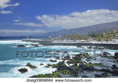 "Surf at the city shore with the bathing landscape of Lago Martianez by the architect Cesar Manrique, Puerto de la Cruz, Tenerife, Canary Islands, Spain, Europe" View Large Photo Image Picture - "Surf at the city shore with the bathing landscape of Lago Martianez by the architect Cesar Manrique, Puerto de la Cruz, Tenerife, Canary Islands, Spain, Europe". Fotosearch