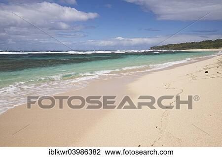Stock Image - "Surf on sandy White Beach, Port Resolution, Tanna Island, Vanuatu, Oceania". Fotosearch