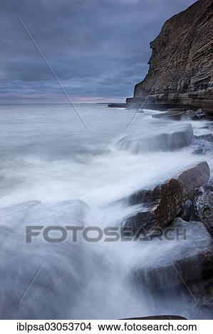 "Surf on the rocky coast with cliffs, Dunraven Bay, Glamorgan Heritage Coast, Wales, United Kingdom, Europe" View Large Photo Image Picture - "Surf on the rocky coast with cliffs, Dunraven Bay, Glamorgan Heritage Coast, Wales, United Kingdom, Europe". Fotosearch