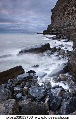 "Surf on the rocky coast with cliffs, Dunraven Bay, Glamorgan Heritage Coast, Wales, United Kingdom, Europe" View Large Photo Image Stock Photograph - "Surf on the rocky coast with cliffs, Dunraven Bay, Glamorgan Heritage Coast, Wales, United Kingdom, Europe". Fotosearch