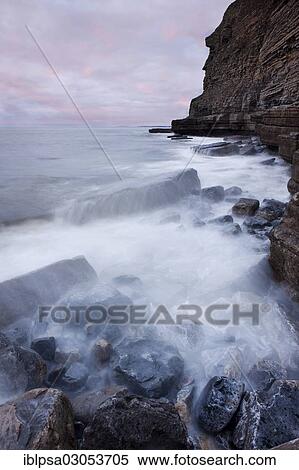"Surf on the rocky coast with cliffs, Dunraven Bay, Glamorgan Heritage Coast, Wales, United Kingdom, Europe" View Large Photo Image Stock Photography - "Surf on the rocky coast with cliffs, Dunraven Bay, Glamorgan Heritage Coast, Wales, United Kingdom, Europe". Fotosearch