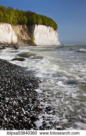 Stock Image - "Surf, steep coast with chalk cliffs in the Jasmund National Park, UNESCO World Heritage Site, Rugen, Mecklenburg-Western Pomerania, Germany, Europe". Fotosearch