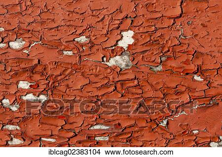 Surface with red paint coming off in flakes View Large Photo Image Picture - Surface with red paint coming off in flakes. Fotosearch