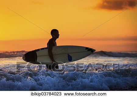 "Surfer at sunset, Sanur Beach, Bali, Indonesia, Asia" View Large Photo Image Stock Image - "Surfer at sunset, Sanur Beach, Bali, Indonesia, Asia". Fotosearch