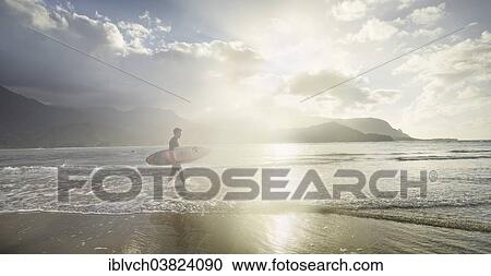 "Surfer, Hanalei Bay Resort, KauaÊ»i, Hawaii, USA" View Large Photo Image Stock Image - "Surfer, Hanalei Bay Resort, KauaÊ»i, Hawaii, USA". Fotosearch
