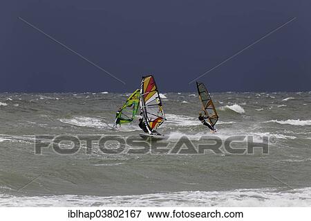 "Surfers on the Baltic Sea off Ahrenshoop, Mecklenburg-Vorpommern, Germany, Europe" View Large Photo Image Stock Photo - "Surfers on the Baltic Sea off Ahrenshoop, Mecklenburg-Vorpommern, Germany, Europe". Fotosearch