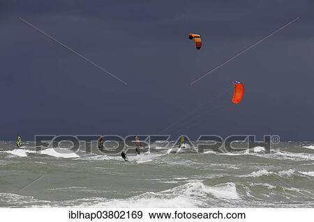 Stock Photo - "Surfers on the Baltic Sea off Ahrenshoop, Mecklenburg-Vorpommern, Germany, Europe". Fotosearch