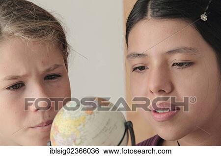 "Sustainability, teenagers and a globe" View Large Photo Image Stock Photograph - "Sustainability, teenagers and a globe". Fotosearch