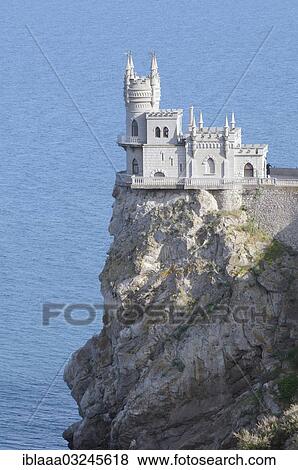 "Swallow's Nest, Neo-Gothic castle, built in 1912, Cape of Ai–Todor, The Greater Yalta, Crimea, Ukraine, Europe" View Large Photo Image Stock Photo - "Swallow's Nest, Neo-Gothic castle, built in 1912, Cape of Ai–Todor, The Greater Yalta, Crimea, Ukraine, Europe". Fotosearch