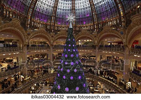Stock Image - "Swarovski Christmas tree in the Great Hall of the Galeries Lafayette, department store, 8th Arrondissement, Paris, Ile-de-France, France, Europe". Fotosearch