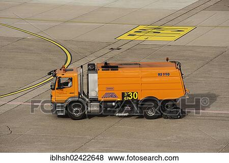 Sweeper in action on the runway, Duesseldorf International Airport, North Rhine-Westphalia, Germany, Europe View Large Photo Image Stock Photo - Sweeper in action on the runway, Duesseldorf International Airport, North Rhine-Westphalia, Germany, Europe. Fotosearch