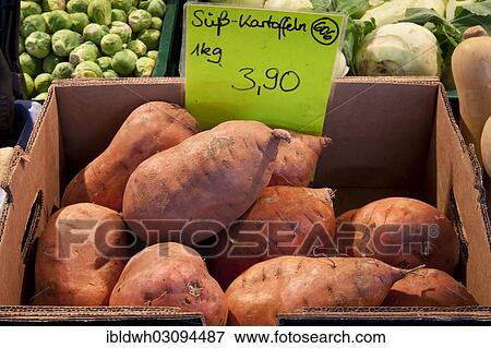 "Sweet potatoes in a box at a market stall, Germany, Europe" View Large Photo Image Stock Photo - "Sweet potatoes in a box at a market stall, Germany, Europe". Fotosearch