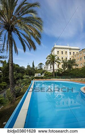 "Swimming pool in front of villa, Fondazione Terruzzi, Villa Regina Margherita, Bordighera, Imperia, Riviera dei Fiori, Liguria, Italy, Europe" View Large Photo Image Stock Photo - "Swimming pool in front of villa, Fondazione Terruzzi, Villa Regina Margherita, Bordighera, Imperia, Riviera dei Fiori, Liguria, Italy, Europe". Fotosearch