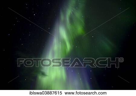 Stock Photography - "Swirling northern polar lights, near Whitehorse, Yukon Territory, Canada, North America". Fotosearch