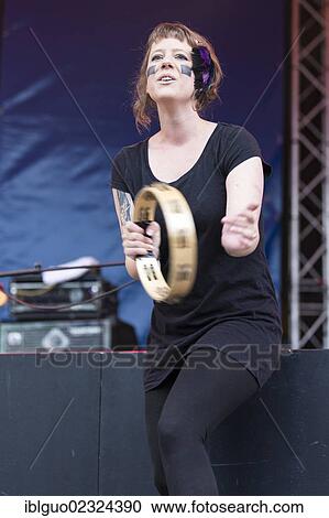 Stock Image - "Swiss singer and musician Anna Aaron playing live at the Blue Balls Festival, pavilion at the lake, in Lucerne, Switzerland, Europe". Fotosearch