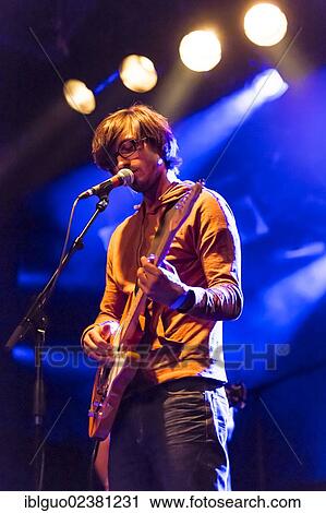 "Swiss singer and musician Michel Gsell, alias Guy Vincent, performing live in the Schueuer concert hall, Lucerne, Switzerland, Europe" View Large Photo Image Stock Image - "Swiss singer and musician Michel Gsell, alias Guy Vincent, performing live in the Schueuer concert hall, Lucerne, Switzerland, Europe". Fotosearch