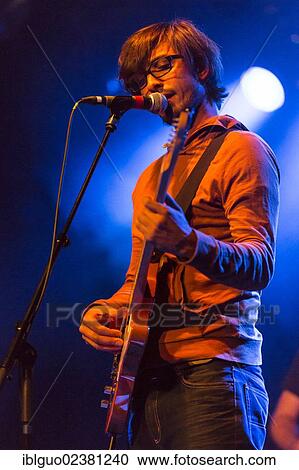 "Swiss singer and musician Michel Gsell, alias Guy Vincent, performing live in the Schueuer concert hall, Lucerne, Switzerland, Europe" View Large Photo Image Stock Image - "Swiss singer and musician Michel Gsell, alias Guy Vincent, performing live in the Schueuer concert hall, Lucerne, Switzerland, Europe". Fotosearch