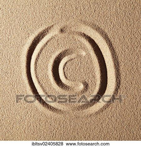 "Symbol for copyright, painted in the sand" View Large Photo Image Stock Photo - "Symbol for copyright, painted in the sand". Fotosearch