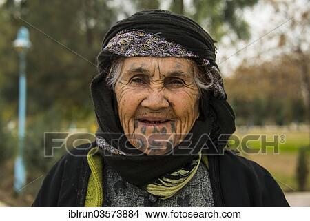 "Syrian Orthodox Kurdish woman with tattoos on her face, Erbil, Arbil Province, Iraqi Kurdistan, Iraq, Asia" View Large Photo Image Picture - "Syrian Orthodox Kurdish woman with tattoos on her face, Erbil, Arbil Province, Iraqi Kurdistan, Iraq, Asia". Fotosearch