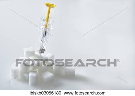 "Syringe filled with insulin, insulin injection sticking in a pile of sugar cubes" View Large Photo Image Stock Image - "Syringe filled with insulin, insulin injection sticking in a pile of sugar cubes". Fotosearch