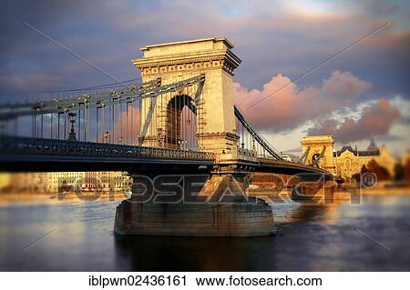 "Szechenyi Lanchid Chain Bridge, suspension bridge over the Danube between Buda and Pest, Budapest, Hungary, Europe" View Large Photo Image Stock Image - "Szechenyi Lanchid Chain Bridge, suspension bridge over the Danube between Buda and Pest, Budapest, Hungary, Europe". Fotosearch
