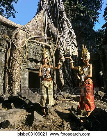 "Ta Prohm temple overgrown with huge roots of Tetrameles nudiflora, temple dancers or apsaras in the courtyard, UNESCO World Cultural Heritage Site, Siem Reap, Siem Reap Province, Cambodia, Asia" View Large Photo Image Stock Image - "Ta Prohm temple overgrown with huge roots of Tetrameles nudiflora, temple dancers or apsaras in the courtyard, UNESCO World Cultural Heritage Site, Siem Reap, Siem Reap Province, Cambodia, Asia". Fotosearch
