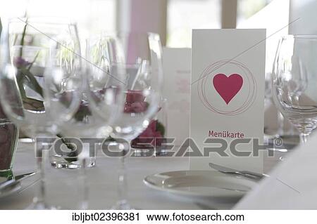 Table decorations and menu cards at a wedding reception View Large Photo Image Stock Image - Table decorations and menu cards at a wedding reception. Fotosearch