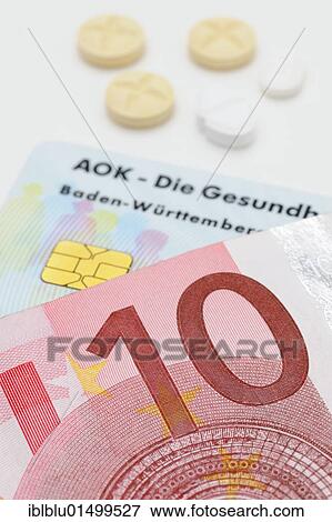 "Tablets, a health insurance card from AOK health insurance and a 10 euro banknote for consultation fees" View Large Photo Image Stock Photo - "Tablets, a health insurance card from AOK health insurance and a 10 euro banknote for consultation fees". Fotosearch