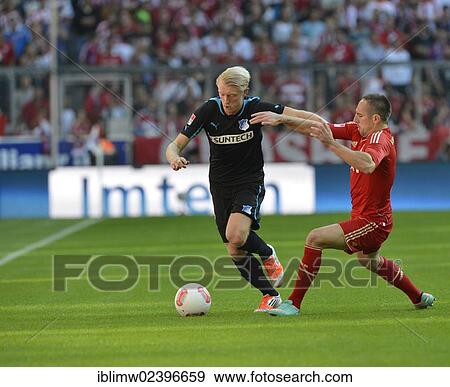 "Tackle, Andreas Beck, TSG 1899 Hoffenheim, on the left, versus Franck Ribery, FC Bayern Munich, on the right, Allianz Arena, Munich, Bavaria, Germany, Europe" View Large Photo Image Stock Photo - "Tackle, Andreas Beck, TSG 1899 Hoffenheim, on the left, versus Franck Ribery, FC Bayern Munich, on the right, Allianz Arena, Munich, Bavaria, Germany, Europe". Fotosearch