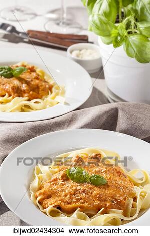 Tagliatelle with tomato sauce View Large Photo Image Picture - Tagliatelle with tomato sauce. Fotosearch