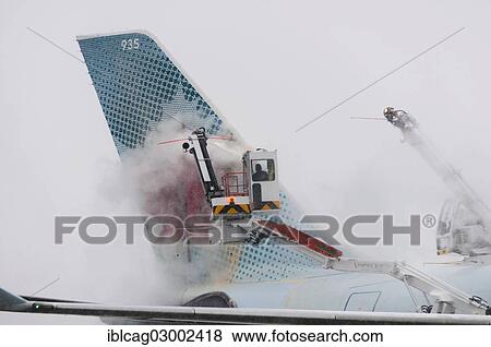 "Tail of an Airbus A330-343x from Air Canada being de-iced at Frankfurt Airport, Flughafen Frankfurt, Frankfurt am Main, Hesse, Germany, Europe" View Large Photo Image Stock Photo - "Tail of an Airbus A330-343x from Air Canada being de-iced at Frankfurt Airport, Flughafen Frankfurt, Frankfurt am Main, Hesse, Germany, Europe". Fotosearch