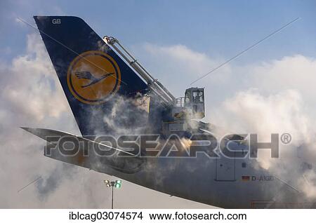 "Tail unit of an Airbus A340 of Lufthansa airlines during de-icing at Frankfurt Airport, Startbahn West Flughafen Frankfurt, Frankfurt am Main, Hesse, Germany, Europe" View Large Photo Image Picture - "Tail unit of an Airbus A340 of Lufthansa airlines during de-icing at Frankfurt Airport, Startbahn West Flughafen Frankfurt, Frankfurt am Main, Hesse, Germany, Europe". Fotosearch