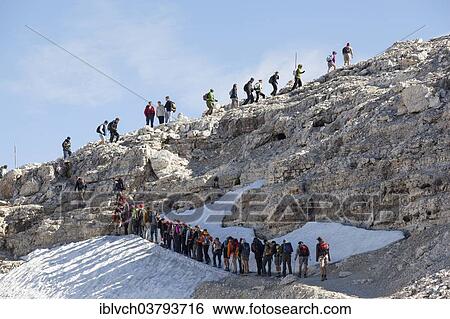 "Tailback of climbers on the hiking trail below Mt Piz Boe, South Tyrol, Alto Adige, Italy, Europe" View Large Photo Image Stock Photograph - "Tailback of climbers on the hiking trail below Mt Piz Boe, South Tyrol, Alto Adige, Italy, Europe". Fotosearch