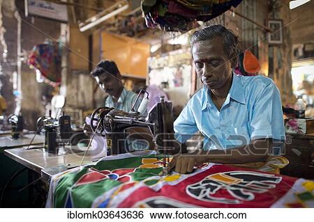 Stock Photograph - "Tailor in a former building of Meenakshi Amman Temple or Sri Meenakshi Sundareswarar Temple, Madurai, Tamil Nadu, India, Asia". Fotosearch