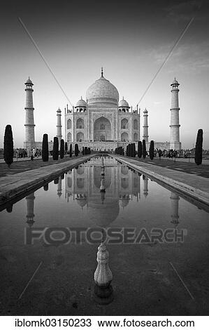 Stock Image - "Taj Mahal, mausoleum, UNESCO World Heritage Site, reflected in a pool of water, Agra, Uttar Pradesh, India, Asia". Fotosearch
