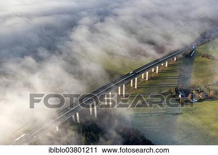 "Talbrucke Wennemen bridge in the fog, A46 motorway, Meschede, Sauerland region, North Rhine-Westphalia, Germany, Europe" View Large Photo Image Stock Image - "Talbrucke Wennemen bridge in the fog, A46 motorway, Meschede, Sauerland region, North Rhine-Westphalia, Germany, Europe". Fotosearch