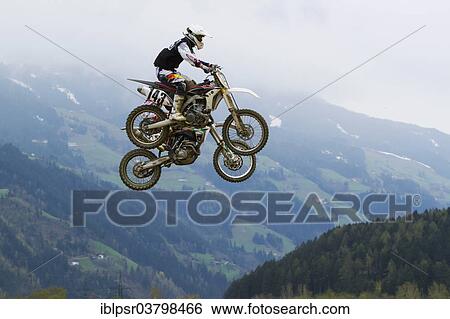 "Tandem jump at the Tyrolean MTB Championships, Aschau im Zillertal, Tyrol, Austria, Europe" View Large Photo Image Stock Photograph - "Tandem jump at the Tyrolean MTB Championships, Aschau im Zillertal, Tyrol, Austria, Europe". Fotosearch