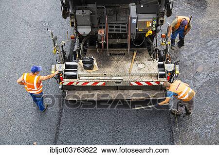 "Tarmac laying machine at a road construction site, Essen, North Rhine-Westphalia, Germany, Europe" View Large Photo Image Stock Image - "Tarmac laying machine at a road construction site, Essen, North Rhine-Westphalia, Germany, Europe". Fotosearch