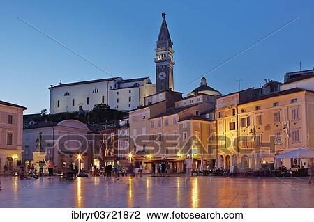 Stock Image - "Tartini Square at dusk, historic center, Piran, Coastalâ€“Karst Statistical Region, Slovenia, Europe". Fotosearch