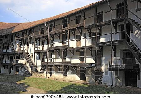 Picture - "Tartlau Fortified Church, the largest church castle in Transylvania, living and storage chambers within the fortress, UNESCO World Cultural Heritage Site, Prejmer, Brasov County, Transylvania, Romania, Europe". Fotosearch